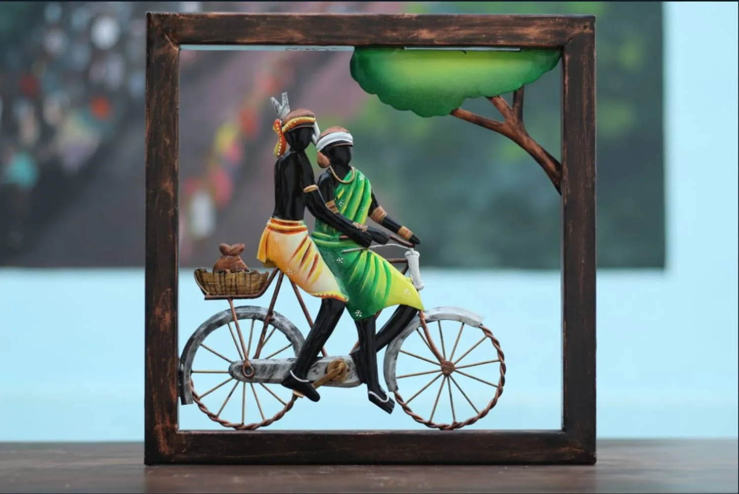 Tribal Couple On Bicycle